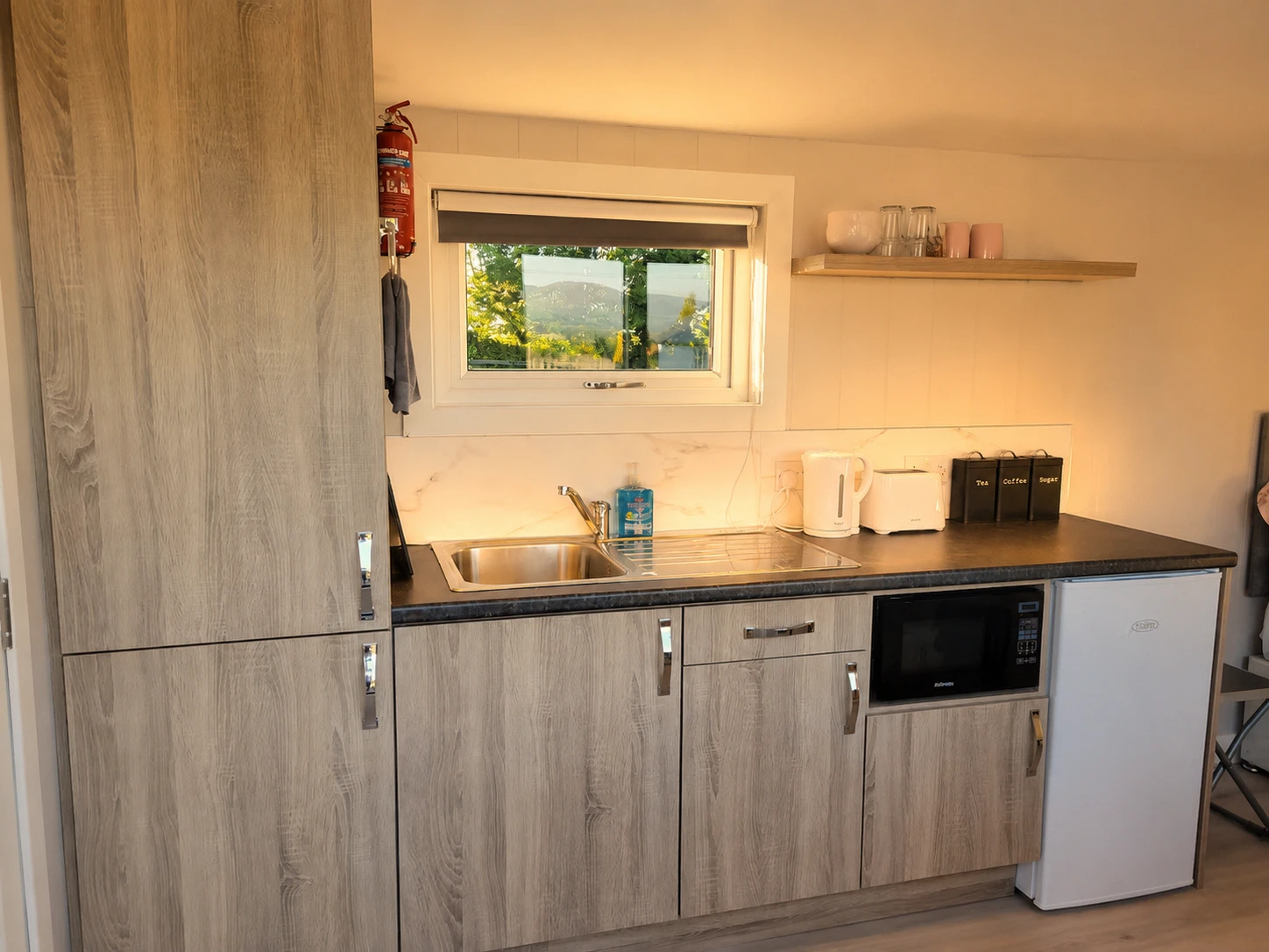 Morning light shining through to the kitchenette